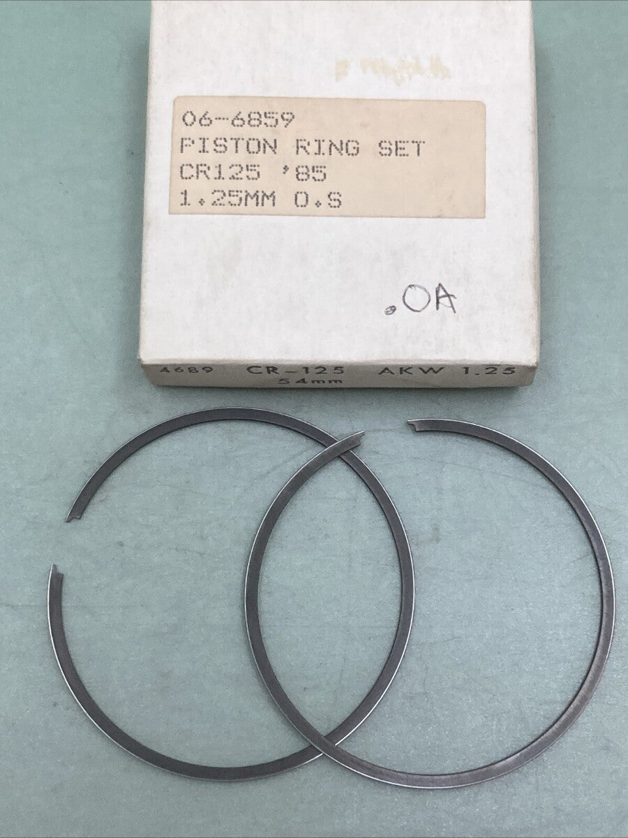 NEW GENUINE ROCKY 06-6859 PISTON RING SET 1.25MM O/S FITS '85 HONDA CR125