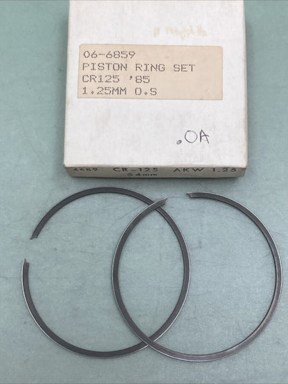 NEW GENUINE ROCKY 06-6859 PISTON RING SET 1.25MM O/S FITS '85 HONDA CR125