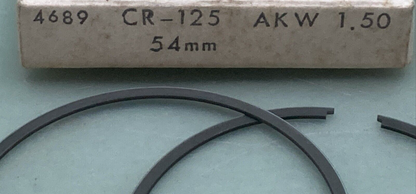 NEW GENUINE ROCKY 06-6860 PISTON RING SET 1.50MM O/S FITS '85 HONDA CR125