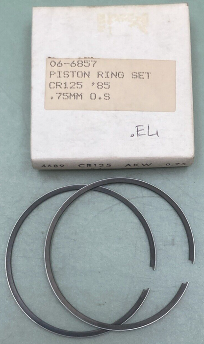NEW GENUINE ROCKY 06-6857 PISTON RING SET 0.75MM O/S FITS '85 HONDA CR125