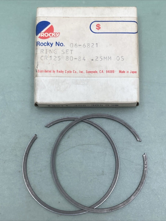 NEW GENUINE ROCKY 06-6821 PISTON RING SET .25MM O/S FITS '80-'84 HONDA CR125