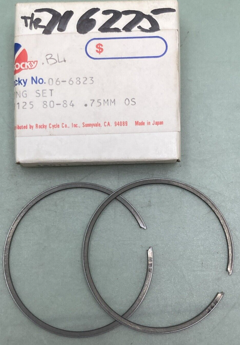 NEW GENUINE ROCKY 06-6823 PISTON RING SET 0.75MM O/S FITS '80-'84 HONDA CR125