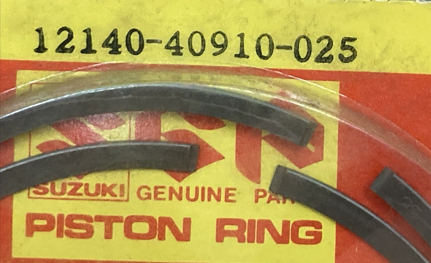 NEW GENUINE SUZUKI 12140-40910-025 PISTON RING SET 0.25 O/S