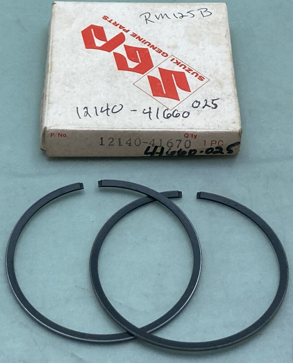 NEW GENUINE SUZUKI 12140-41670 PISTON RING SET 0.25 O/S FITS RM125