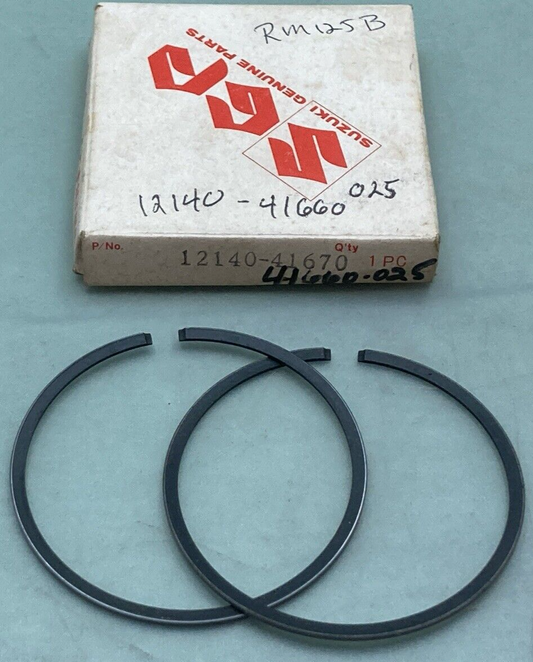 NEW GENUINE SUZUKI 12140-41670 PISTON RING SET 0.25 O/S FITS RM125