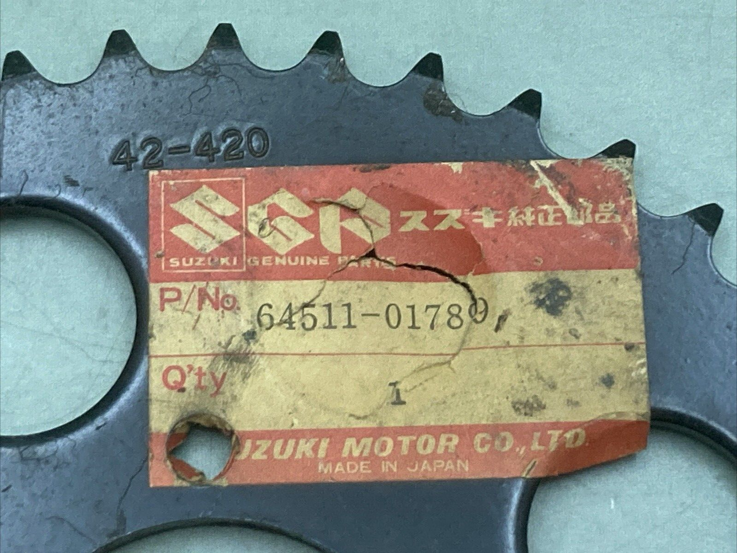 NEW GENUINE SUZUKI 64511-01780 SPROCKET REAR BLACK 42T