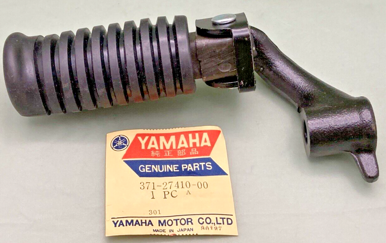 NEW GENUINE YAMAHA 371-27410-00 FRONT FOOTREST ASSEMBLY L