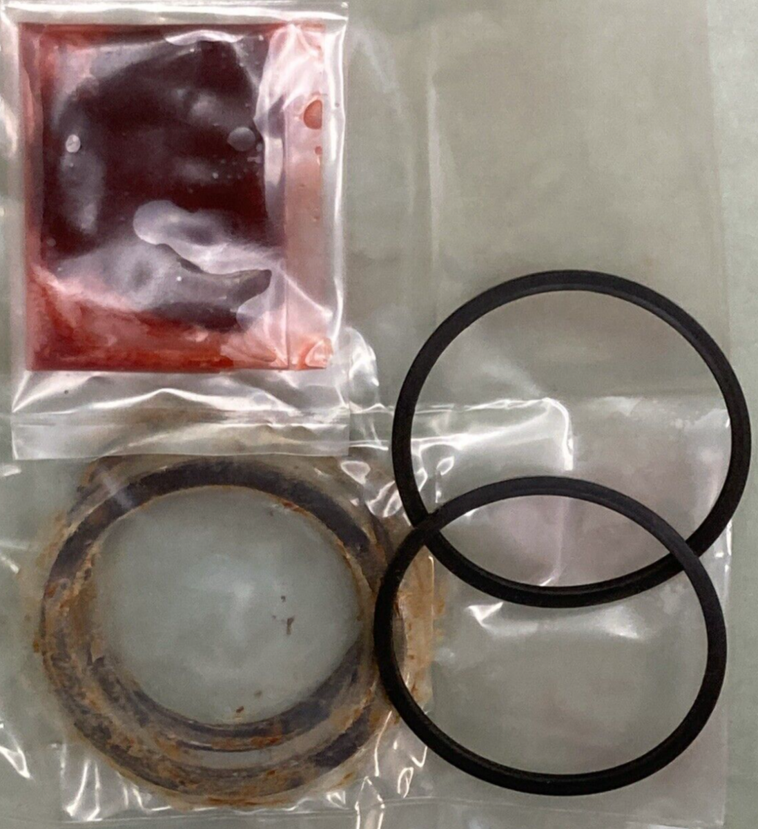 NEW GENUINE YAMAHA 26H-W0057-00 CALIPER PISTON KIT FRONT BRAKE