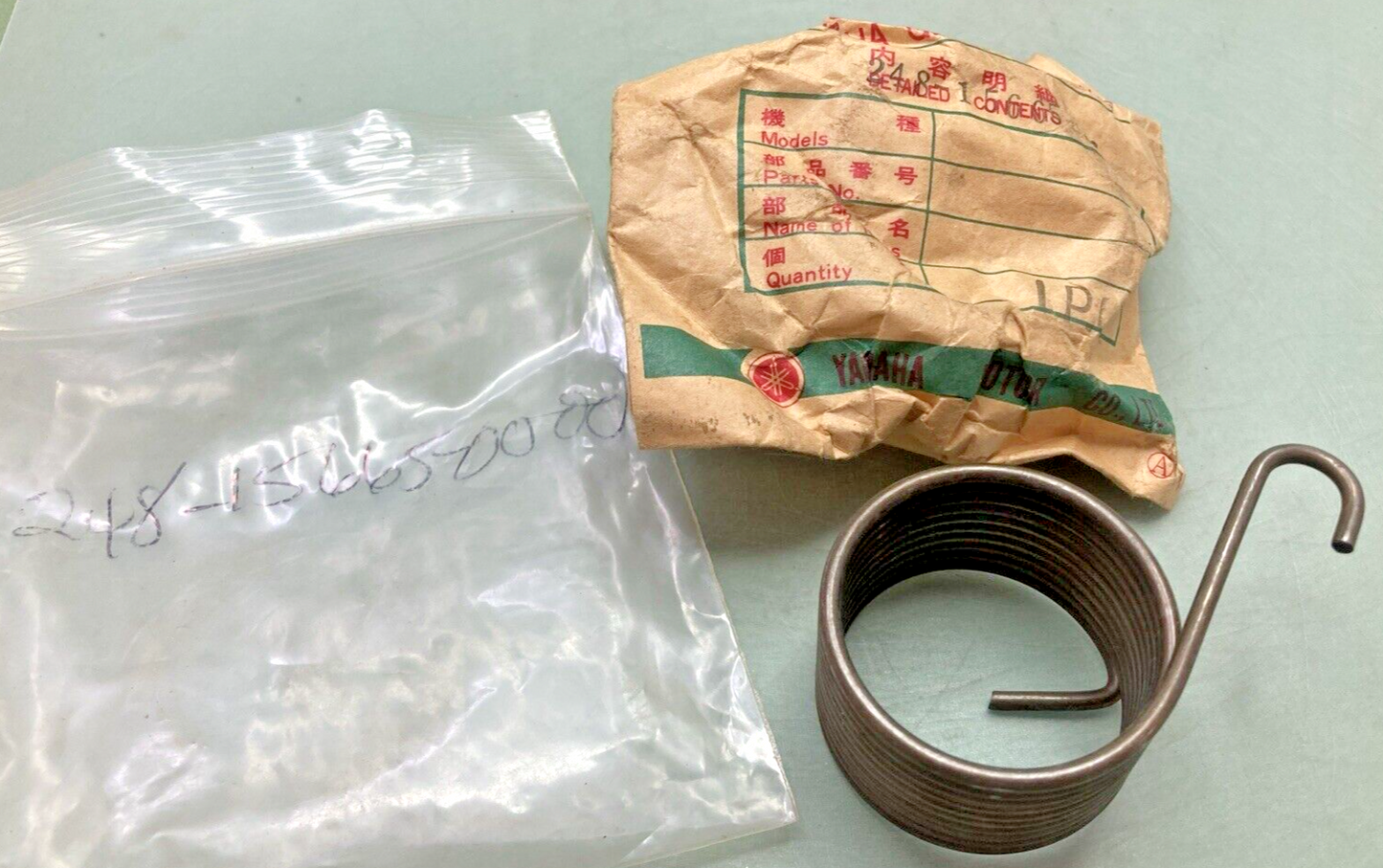 NEW GENUINE YAMAHA 248-15665-00 SPRING, TORSION