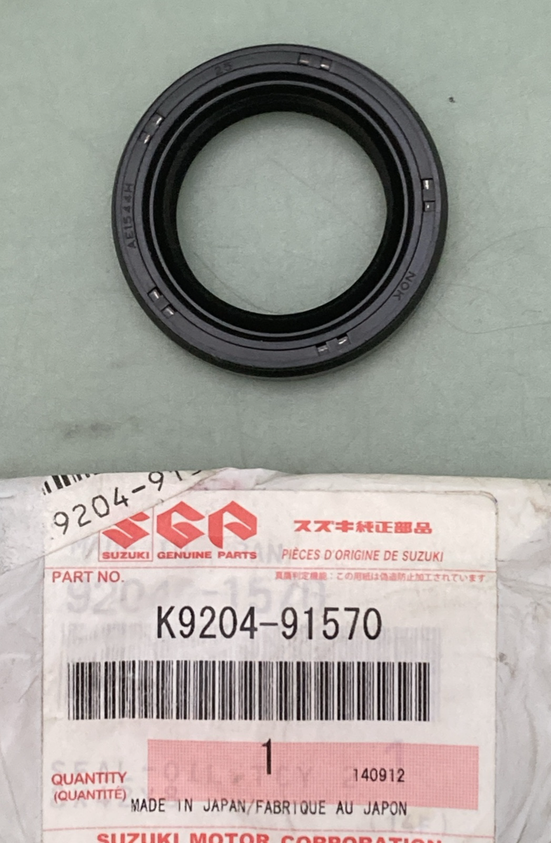NEW GENUINE SUZUKI K9204-91570 OIL SEAL