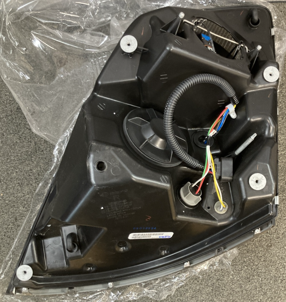 NEW GENUINE DEPO 373-1118RXASD2 Headlight Assembly Passenger Dark Lens