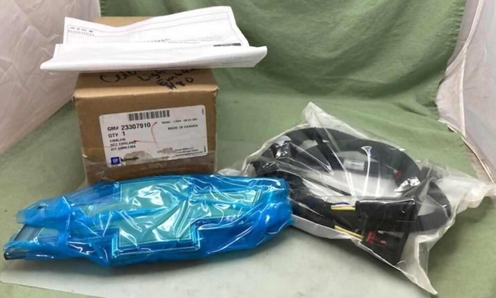 GM 23307910 Exterior Trim Illuminated Emblem New Genuine