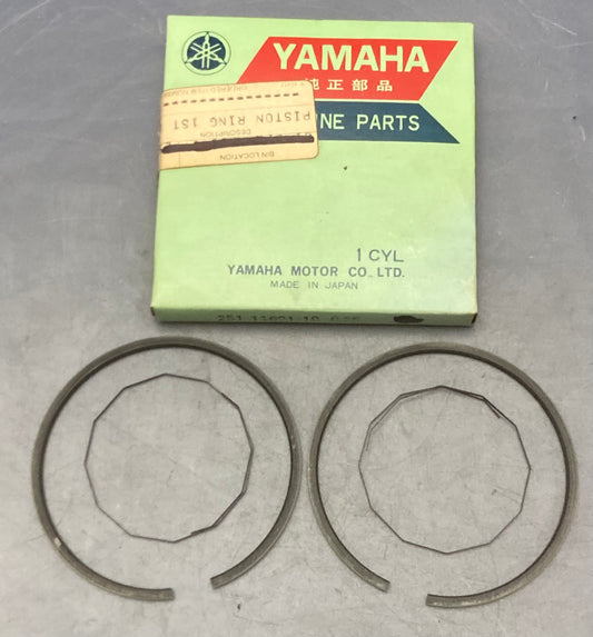 New Genuine Yamaha 251-11601-10 Piston Ring Set .25