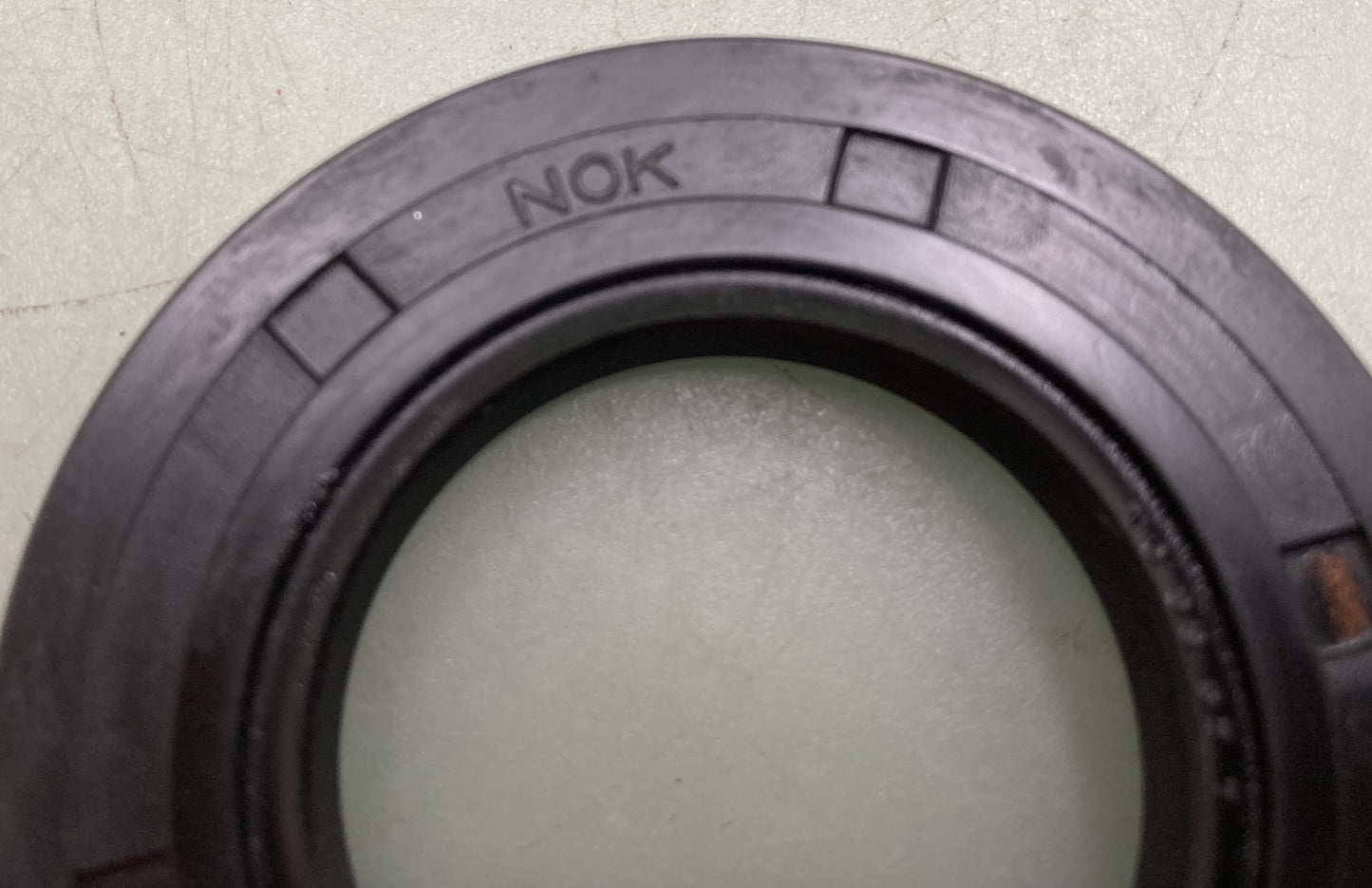 New Genuine NOK AE1940F Rotary Shaft Seal: 1 Lip w/Spring, 19 mm ID, 40 mm