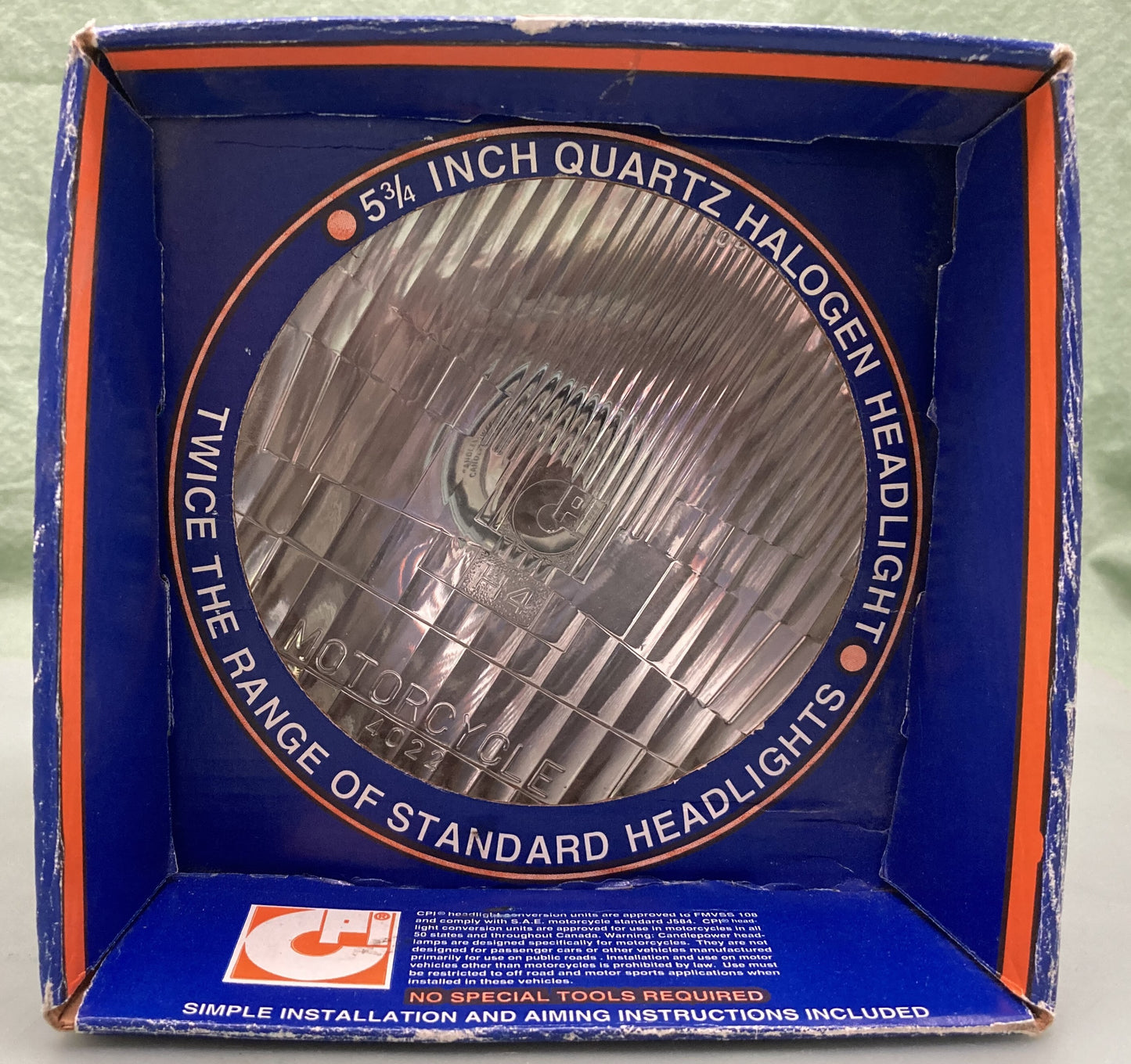 New Genuine Candlepower H402212 5 3/4in Quartz Halogen Headlight, Harley-Davison