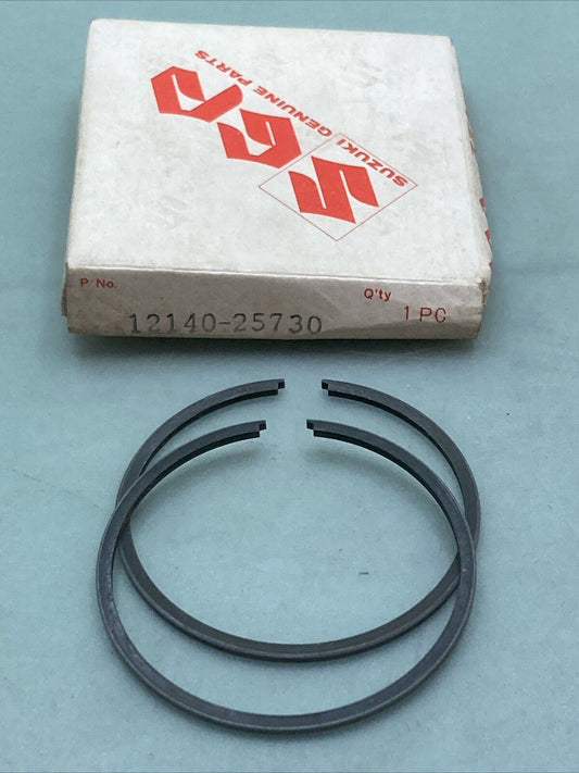 NEW GENUINE SUZUKI 12140-25730 PISTON RING SET 0.50 O/S FITS TC90 TS90