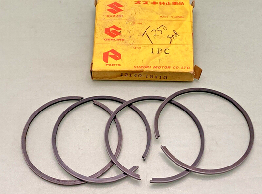 NEW GENUINE SUZUKI 12140-18410 PISTON RING SET, 1972 SUZUKI T250 II, RJ