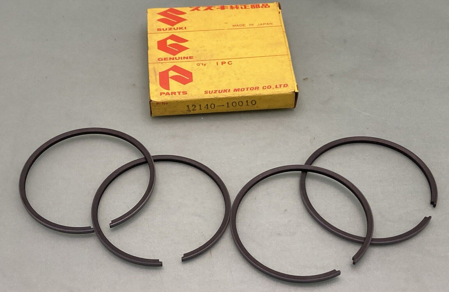 QTY2 NEW GENUINE SUZUKI 12140-10010 PISTON RING SET, 1968 SUZUKI T200 TC200