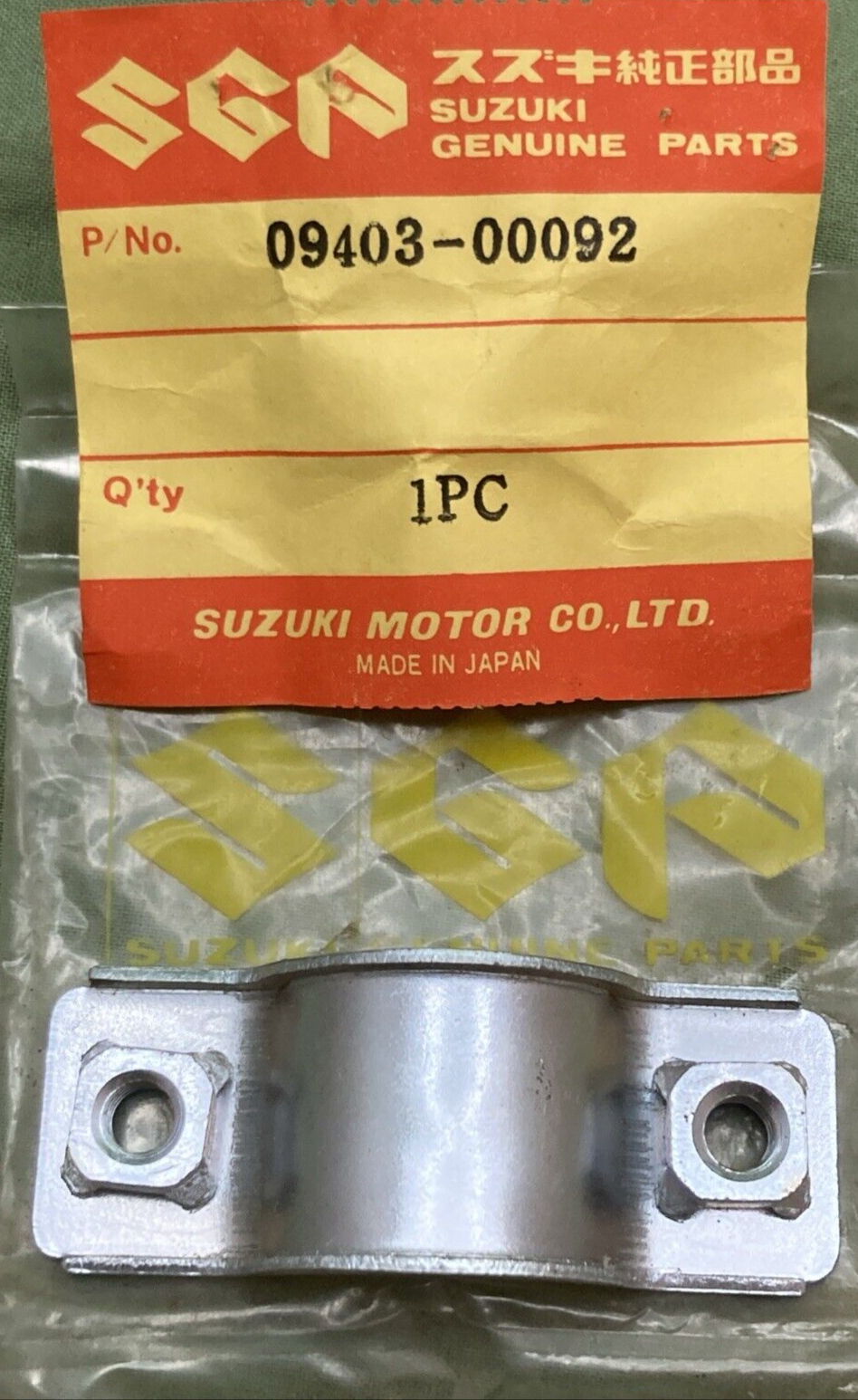 NEW GENUINE SUZUKI 09403-00092 BAND BRACKET 1-3/8" LENGTH 7/8" WIDE 1/4" BOLT