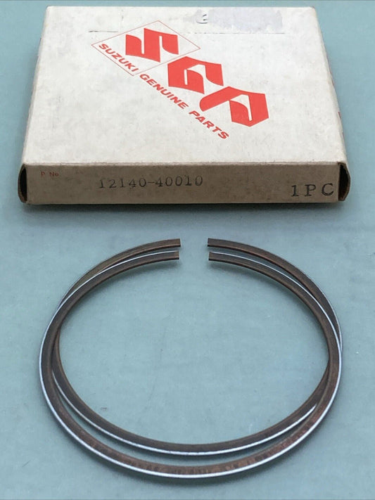 NEW GENUINE SUZUKI 12140-40010 PISTON RING SET 0.25 O/S