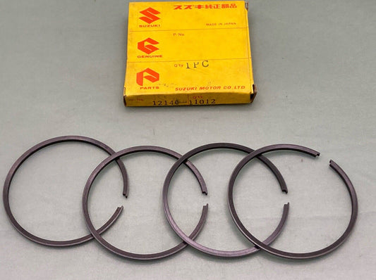 NEW GENUINE SUZUKI 12140-11012 PISTON RING SET, 1969 SUZUKI T20 TC250