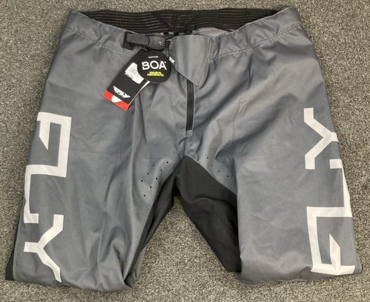 NEW GENUINE FLY RACING 377-53038 KINETIC RELOAD PANTS CHAR/BLK/IRIDIUM SZ38