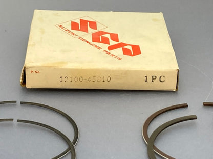 Suzuki 12100-45810 Piston Ring Set New Genuine