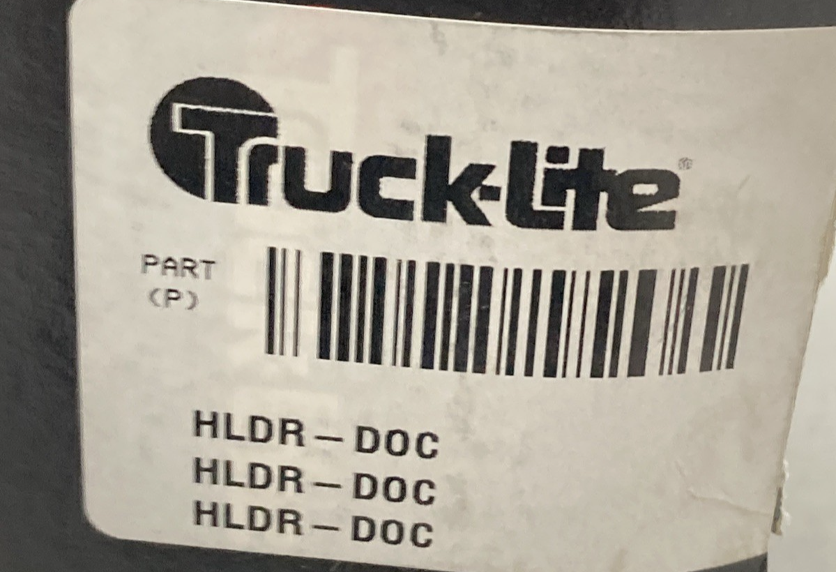 NEW GENUINE TRUCK-LITE HLDR-DOC ROUND VEHICLE DOCUMENT HOLDER