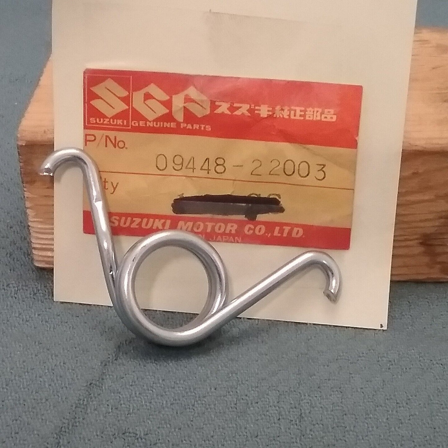 NEW GENUINE SUZUKI 09448-22003 SPRING REAR SWINGING ARM RM80 1977-1983