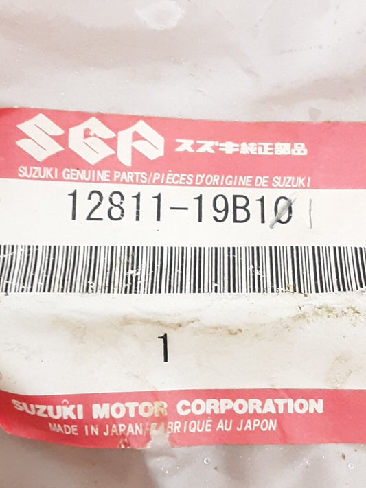 NEW GENUINE SUZUKI 12811-19B11 TENSIONER, CAM CHAIN QuadRunner LT-4 LT-F250 1987
